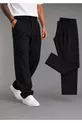 Pantalon large pour homme, coupe baggy, flexible et fluide, avec détails plissés