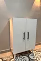 Multifunktionaler weißer Kleiderschrank **