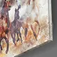 Peinture sur verre de chevaux au galop