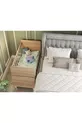 Berceau rétro en bois coloré avec tiroir et lit offert